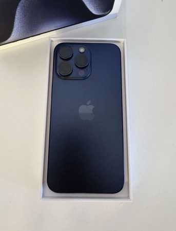 iPhone 15 Pro Max (256GB) - Blue Titanium - Battery 88% - 563 cycles - Box and charger view 2